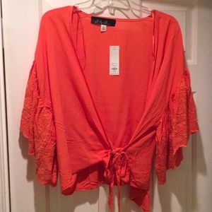 Orange wrap top with bell sleeves